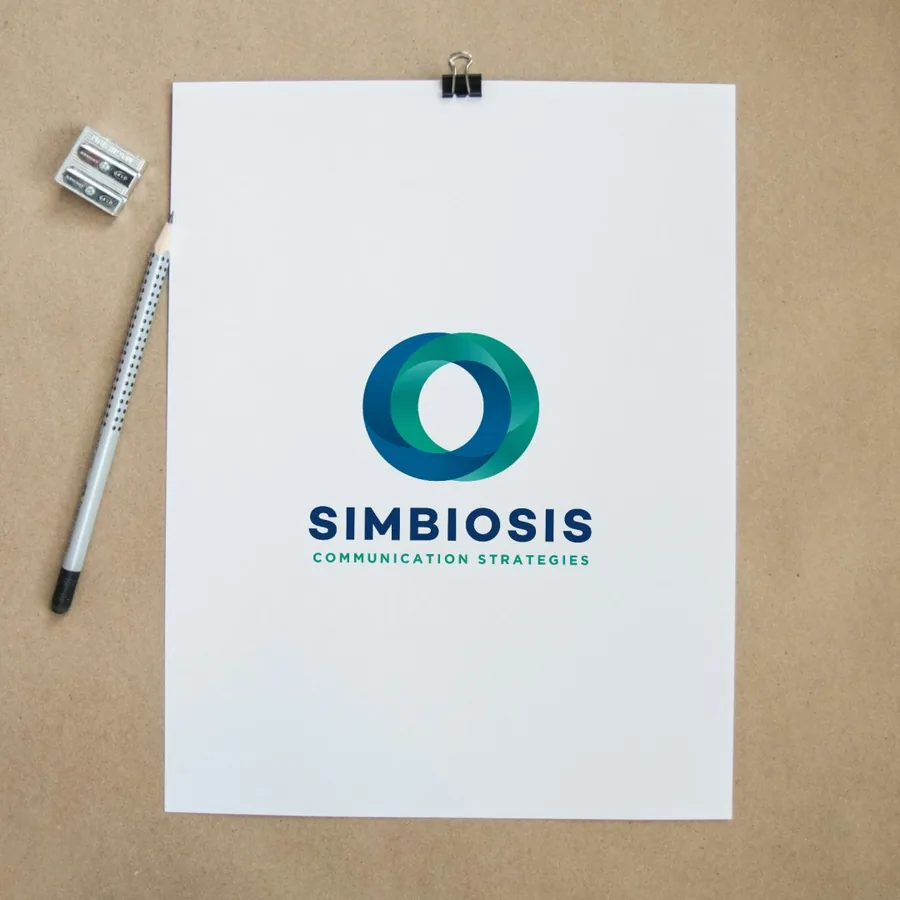 Simbiosis brand on a letter